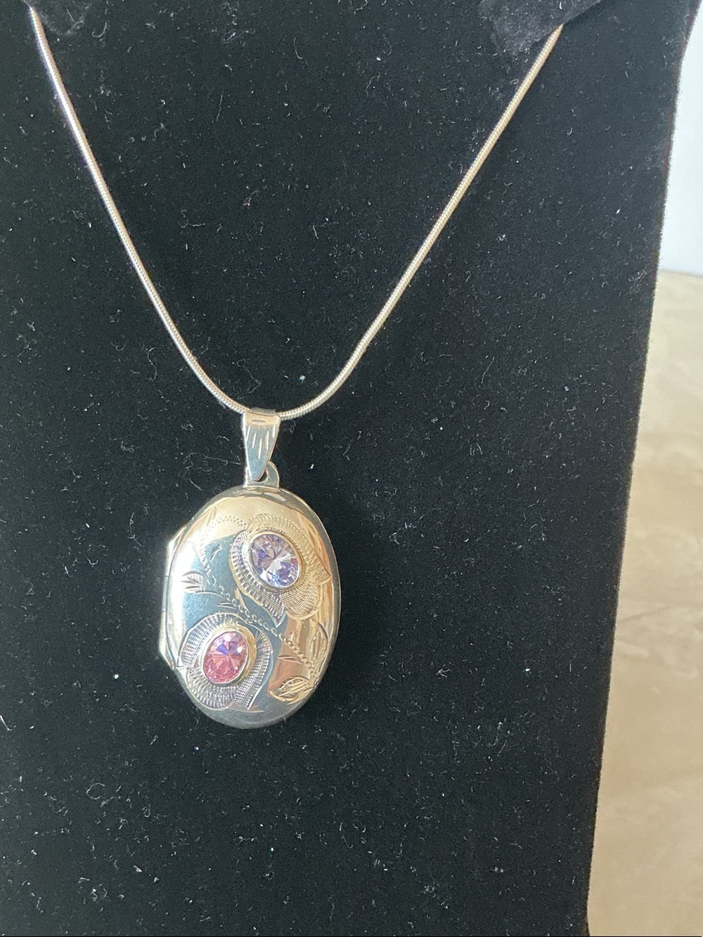 Gold-Tone Oval Locket Necklace with Pink and Purple Gem Accents